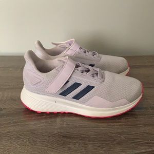 Girl purple adidas shoes in good condition.